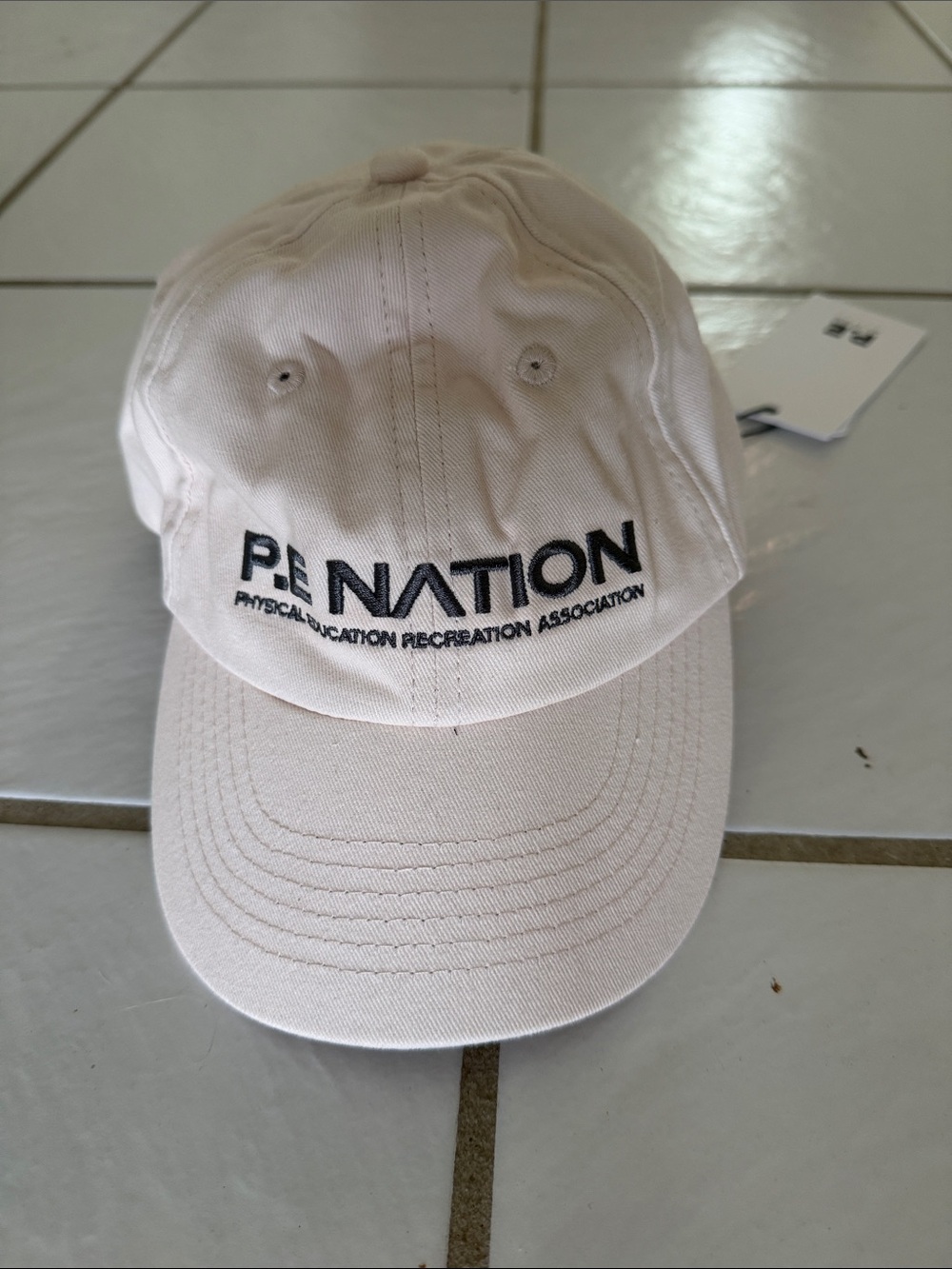 P.E Nation Beige Homage Cap with Black Tag Detail